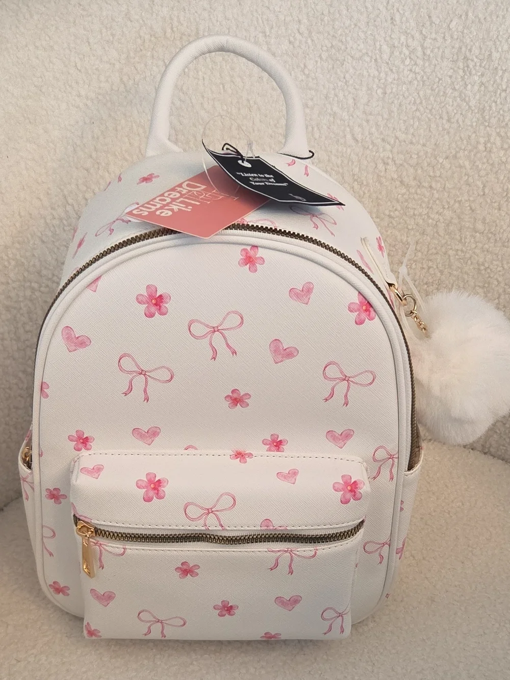 White & Pink Floral Mini Backpack with Pom Charm